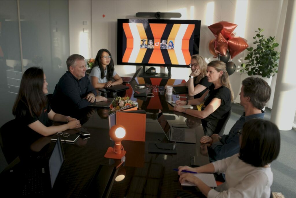 In this image, we can see Games Studio people in a Meeting room. Games Studio offices