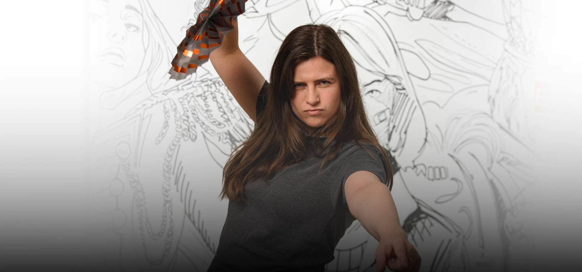 Games Studio 'Meet Lise' banner variant, without text overlay: a portrait of a woman posing with a folded orange-and-black fan raised overhead, against a black-and-white illustrated backdrop that fades to white on the left